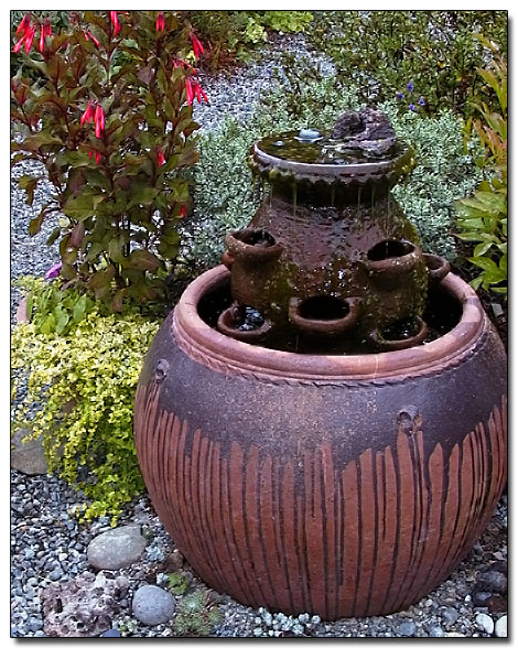 Strawberry Pot as a water feature.